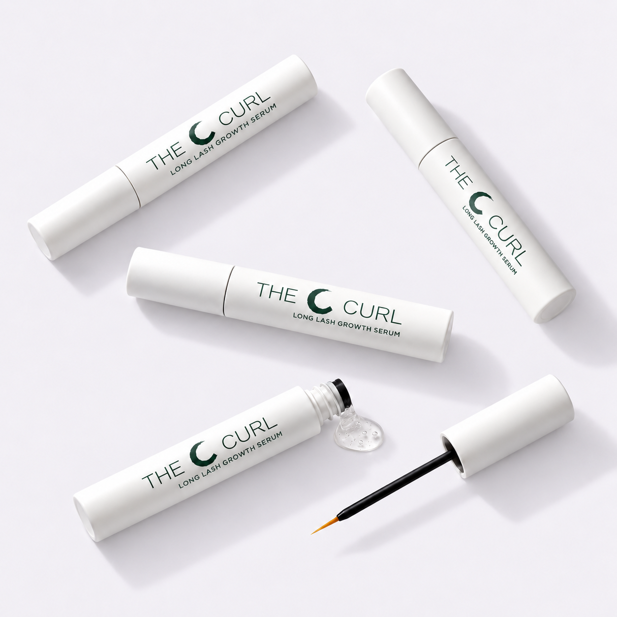 The C Curl Long Lash Growth Serum tubes and fine applicator